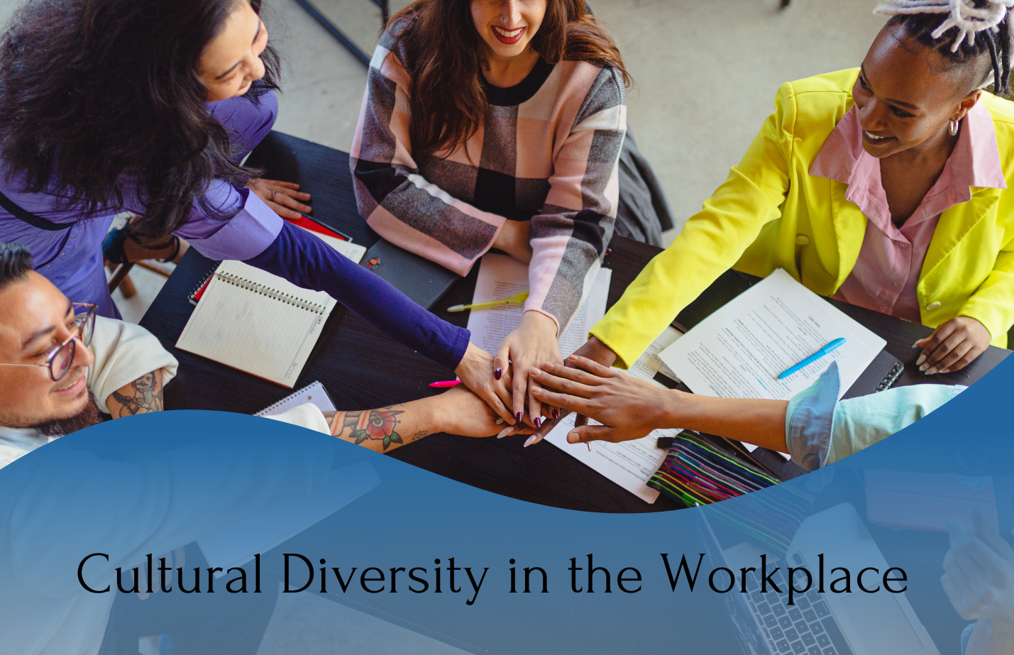 A group of individuals piling their hands in the middle and a written text of "Ways To Promote Cultural Diversity In The Workplace"